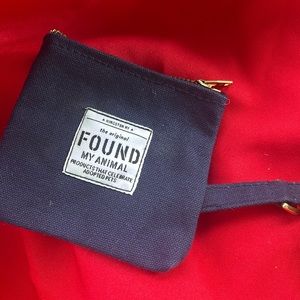 Found my animal denim poop bag holder. Nwts